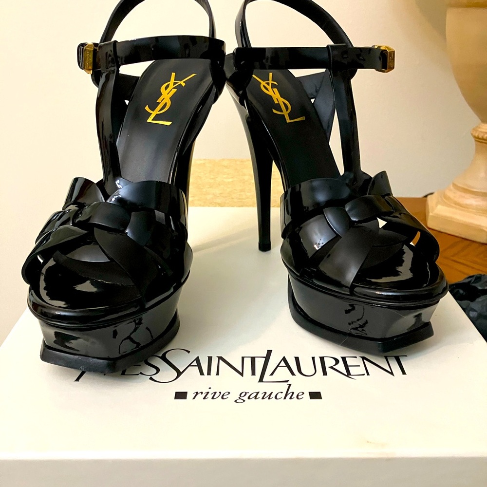 Yves Saint Laurent Tribute Black Patent Leather Sandal 
36.5 $ 875.00 heel 5.5”